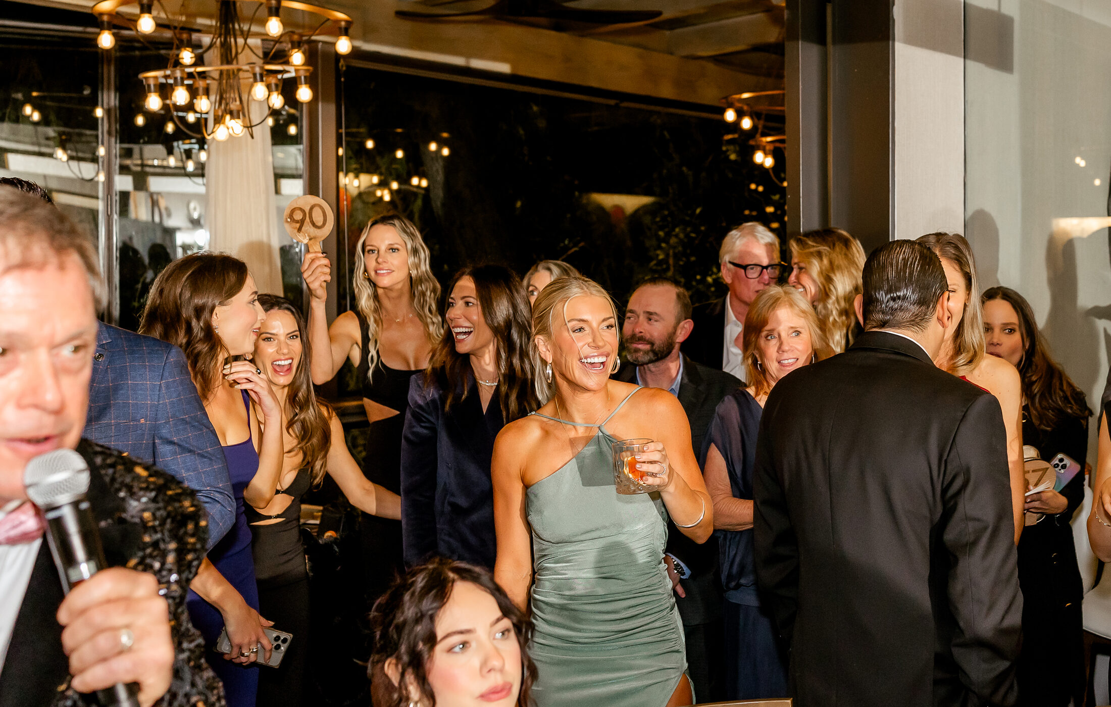 Live fundraising auction in a ballroom